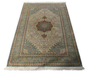 
	
		A Turkish Kayseri silk carpet, third quarter 20th century, the central floral medallion...
