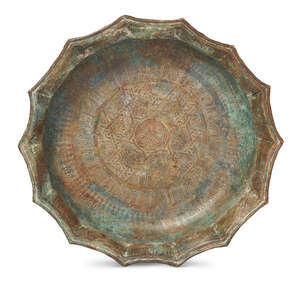 
	
		A large Khorasan silver and copper inlaid inscribed basin, Northeast Iran, 12th century,...