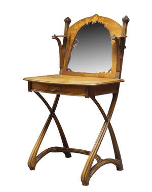 
	
		Louis Majorelle (1859-1926), an Art Nouveau marquetry and carved Coiffeuse  
		