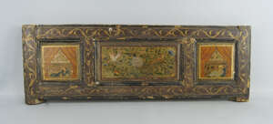 An Islamic wooden painted panel, probably of architectural origin, decorated with birds and...