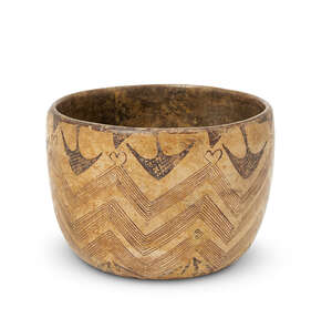 A Nayarit pre-Columbian pottery bowl, 300B.C.-300A.D., painted in the Chinesco style, with painted black zig-zag design to body, the exterior rim with a series