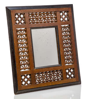 
	
		A Mashrabiya framed mirror, possibly retailed by Liberty and Co    
		c.1900, unsigned  ...