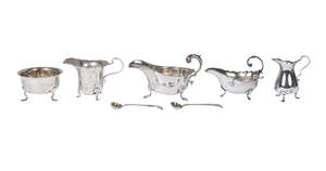 
	
		Two silver sauce boats, together with two cream jugs, a small circular bowl, on three pad...