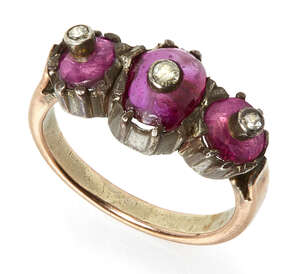 
	
		A ruby and diamond three-part ring, India, 19th- early 20th century, the rose gold ring...