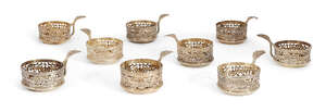 
	
		A set of nine French silver gilt cup holders, Risler & Carré, Paris, 1897-1912, with...