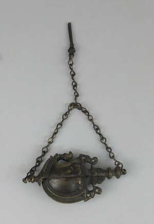 
	
		A bronze khol container in the form of a mango fruit, Deccan, 18th century, with two...
