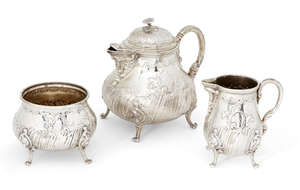 
	
		A German 800 silver three piece tea set, unknown maker, comprising a round bellied...