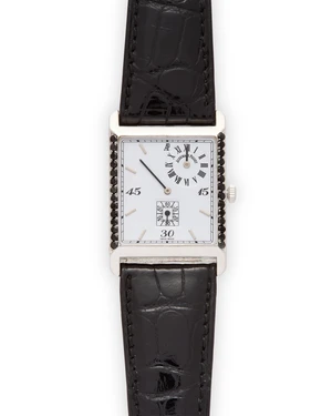 Audemars Piguet. An 18ct white gold and later diamond set manual wind rectangular wristwatch...