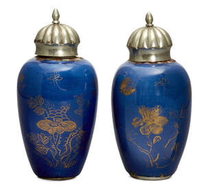 A pair of Chinese small powder blue ground vases, Kangxi period, painted in gilt with butterflies above floral sprays, with silver covers, 10.5cm high