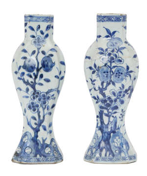 
	
		A pair of Chinese porcelain vases, Wanli period, painted in underglaze blue with fruiting...