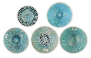 
	
		Five turquoise glazed pottery bowls, Iran, 12-13th century, of conical shape on short...