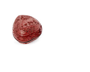 
	
		A Chinese cinnabar lacquer peach-shaped box and cover, 19th century, carved to the cover...