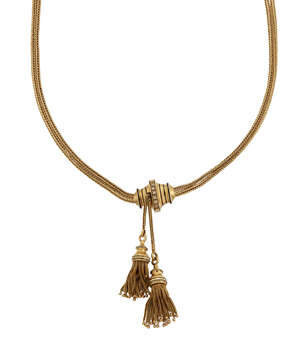 An early 20th century gold necklace, of double-row chevron-link design suspending a black enamel and seed pearl slide with fringe tassel drops, length 36.0cm