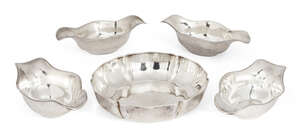 
	
		Four French silver sauce boats and a scalloped silver dish, H Fres. & Cie, c.1900, all...
