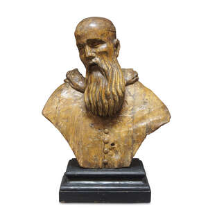 
	
		A provincial Italian walnut bust of a Saint, elements 19th century, modelled with a...