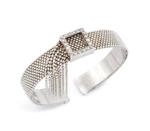 A diamond torque bangle, with brilliant-cut diamond buckle form panel with bead-link chain...