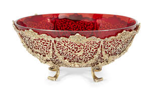
	
		A 19th century Dutch gilded silver dish with red glass liner, stamped with import marks...
