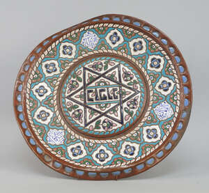 
	
		A Continental copper and enamel dish, Syria, 19th century, the central panel with the...