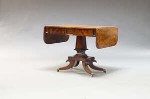 
	
		A Regency mahogany and crossbanded sofa table, the rectangular top with two drop leaves,...