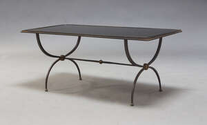 
	
		Maison Ramsay Attributed, a cast iron and mirrored coffee table, c.1960, the rectangular...