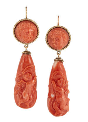 
	
		A pair of late 19th century coral earrings, each tapered drop carved with a putto, the...