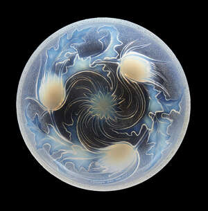 
	
		Etling, an opalescent glass shallow bowl
		Second quarter 20th Century, moulded Etling...