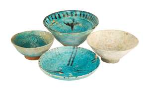 
	
		A group of pottery bowls, Iran and Afghanistan, 12th century, three of conical form, one...