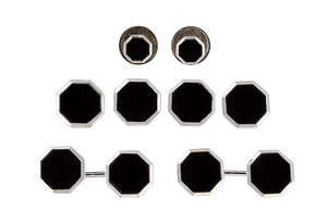 An early 20th century, 9ct gold and onyx dress set, comprising: a pair of cufflinks designed as octagonal onyx panels to bar-link connections; four matching dr
