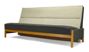 
	
		A folding sofa bed, in the manner of Ernest Race  
		c.1960,
		Upholstered in two tone...
