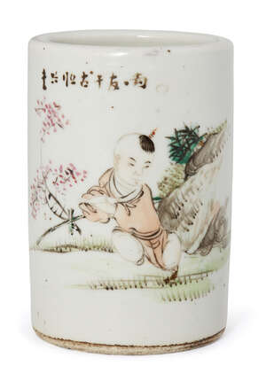 
	
		A Chinese porcelain brush pot, Republic period, painted with a boy resting in a garden...