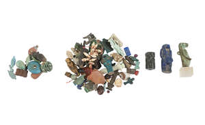 
	
		A group of Egyptian amulets and jewellery elements, New Kingdom, late 18th- early 19th...