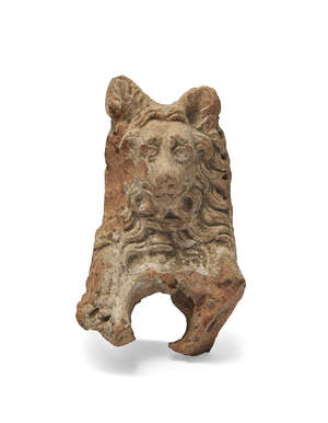 A Roman terracotta Molossian hound, circa 1st century A.D., forming part of a water spout, the foreparts of the dog modelled with well-defined curls of thick f