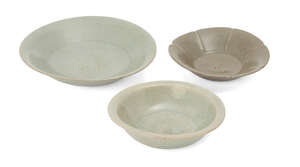 
	
		Three Chinese Longquan celadon small dishes, Song - Yuan dynasty, each with differing...