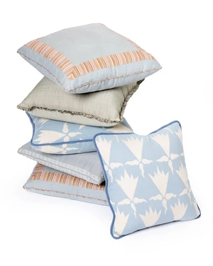 A group of six cushions by Robert Kime Ltd., comprising: pair of modern pale blue cotton cushions with multi-coloured striped border; 51 x 51cm; a pair of pale