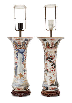 
	
		A pair of Japanese Imari porcelain vases, early 19th century, painted with birds amongst...