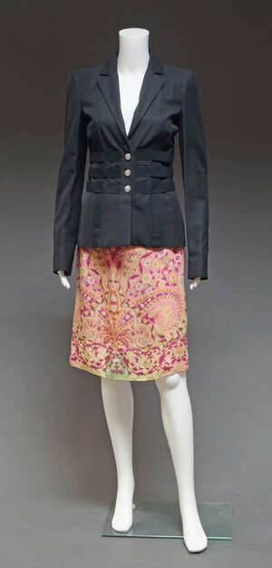 
	
		Versus, Versace, a black cotton/viscose fitted jacket, with open strap work to the body,...