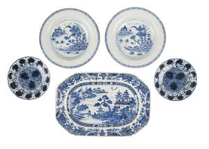 Five Chinese porcelain dishes, 18th century, all painted in underglaze blue, comprising a canted dish decorated with a river landscape, 25.5cm diameter, a pair
