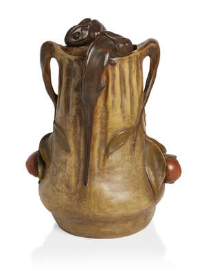 
	
		Goldscheider (Austrian), a large earthenware vase with two branch-like handles and two...