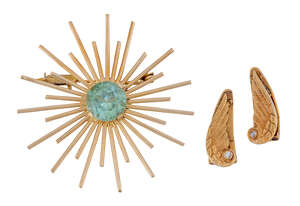 A pair of gold and diamond earclips and a blue zircon brooch, each earclip designed as a wing with engraved detail and old-brilliant-cut diamond accent, length