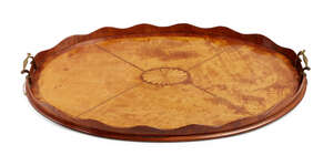 
	
		A George III satinwood oval tray, wavy gallery, with central inlaid batwing oval and twin...