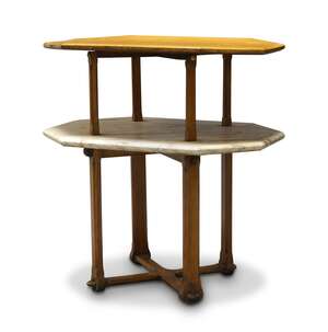 
	
		A Gothic Revival oak and marble two-tier centre table
		late 19th Century
		The...