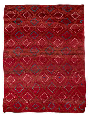 
	
		a handwoven long pile wool rug
		Second quarter 20th century
		Woven with irregular...