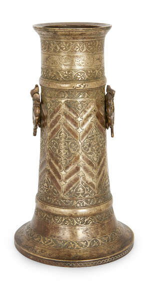 
	
		A brass torch stand (mash'al), Iran, late 16th century, with faceted body and splayed...