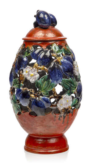 
	
		An Austrian Pottery terracotta openwork vase and cover in the Viennese Gmundner...