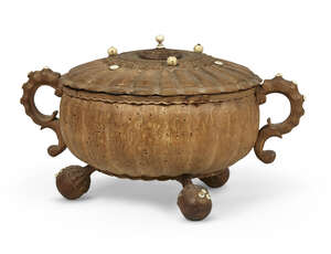 
	
		A Swedish burr birch kallskål, 17th/18th century, of typical form, with bone mounts, twin...