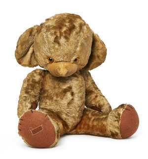 
	
		A large plush teddy bear, probably Chad Valley, with interior bells to the ears, vacant...