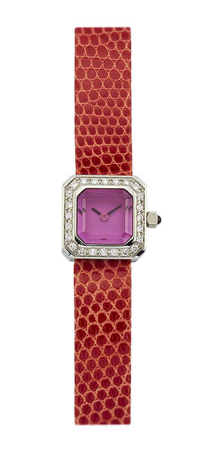 
	
		A lady's diamond 'Sugar Cube' quartz wristwatch, by Corum,  the square dial with deep...