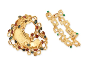 Two openwork brooches, comprising: a 14ct gold textured openwork brooch, by Grosse, with enamel...