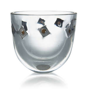 
	
		Anna Dickinson (British 1961-), a clear glass bowl 
		c.1980, unsigned 
		A small and...
