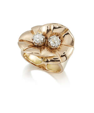 
	
		A 1940s, gold, diamond two stone ring, of retro twin flowerhead design, each flowerhead...